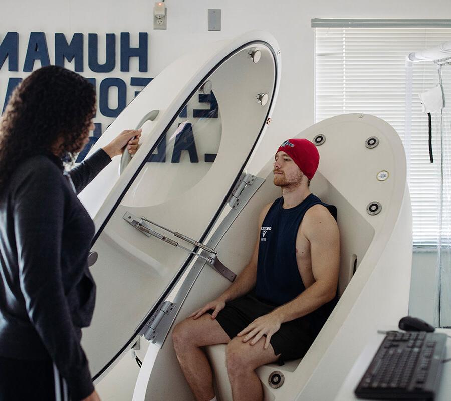 Exercise science student conducts a laboratory test.